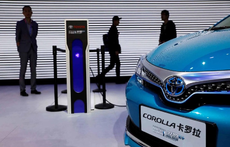 Toyota, pressed to innovate, is cutting marketing costs to fuel research