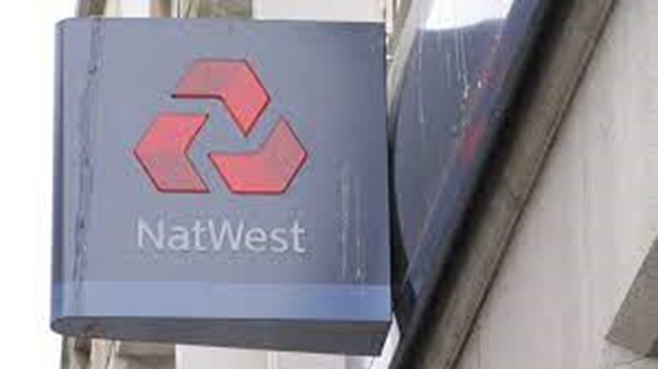 Britain lowers stake in NatWest with .59 bln share sale